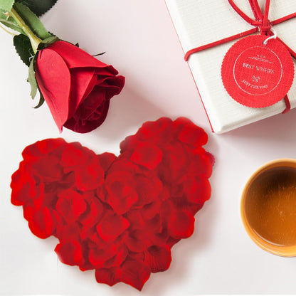 Lot de 1200 pétales de roses artificielles rouges, parfaits pour décorer une chambre ou créer une ambiance romantique.