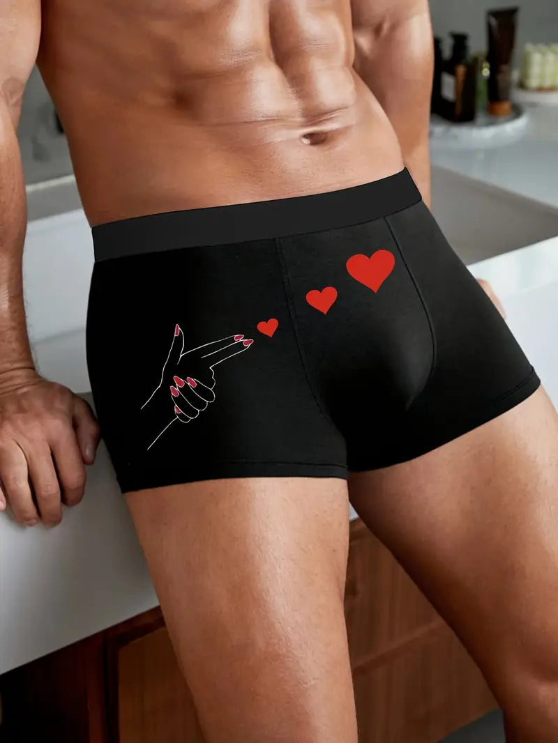 Slip noir sexy pour hommes, orné d'un imprimé élégant représentant des mains rouges et un motif "Amour"