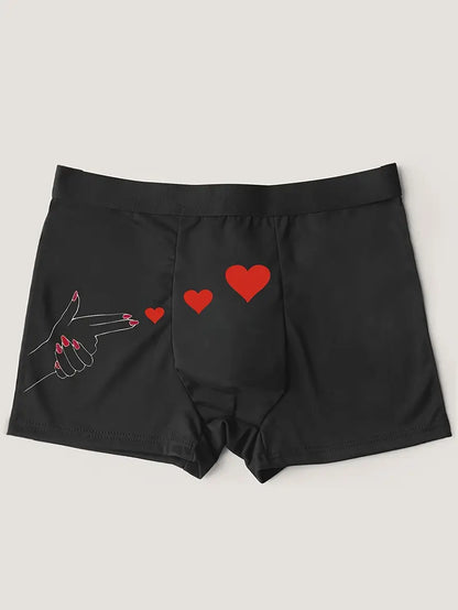 Slip noir sexy pour hommes, orné d'un imprimé élégant représentant des mains rouges et un motif "Amour"